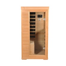 Sala de sauna com porta de vidro para uma pessoa